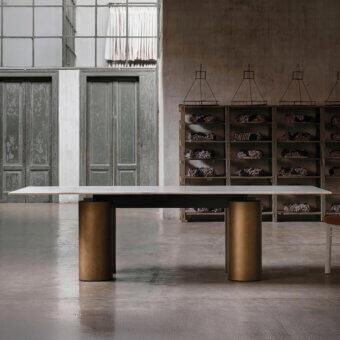 Lavish Acerbis Serenissimo table with Calacatta gold marble and satin finish sandblasted blown glass cylinders in golden-bronze tone
