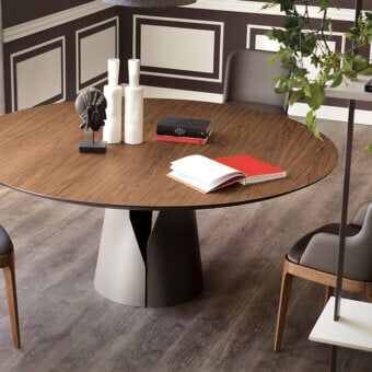 Distinguished Cattelan Italia Giano table with round Canaletto walnut wood top and embossed graphite lacquered steel base