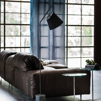 Elegant Cattelan Italia Karibù floor lamp with black painted steel frame and cement base, showcasing a cotonette lampshade