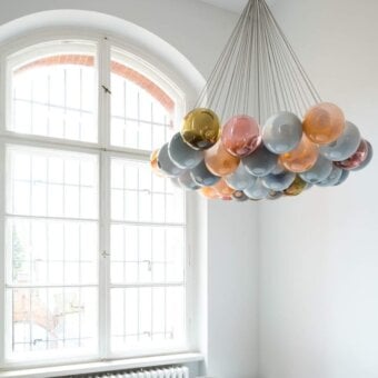 Distinguished Bocci 28 Cluster suspension lamp with hand-blown clear glass spheres and vibrant blue, orange, pink, yellow shades within a milk white interior