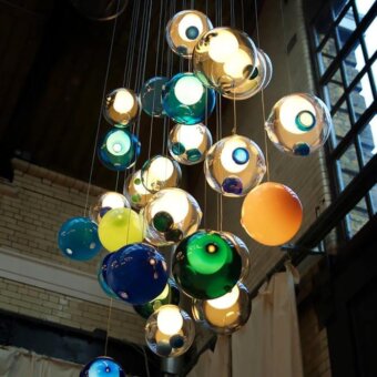 Captivating Bocci 28 Random suspension lamp crafted from glossy blown glass with blue, green, yellow, and orange internal elements