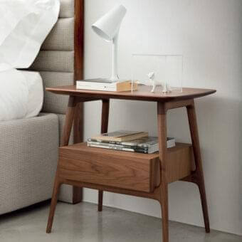 Elegant Porada Bilot nightstand with solid canaletto walnut and smooth finish creating a balanced silhouette