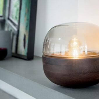 Refined Porada Bolla table lamp with smoked glass diffuser atop a Wenge stained solid ash base and metallic band