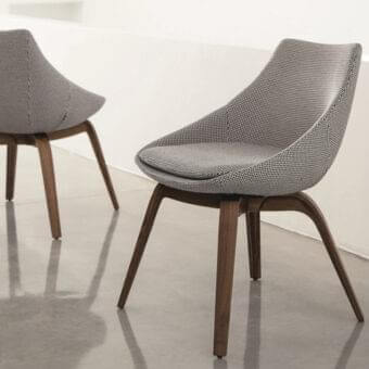 Sophisticated Porada Penelope chair with curved canaletto walnut frame and light gray textile upholstery in dark brown finish