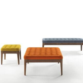 Lavish Porada Webby ottoman with tufted orange fabric and matte canaletto walnut frame