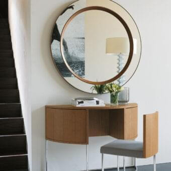 Elegant Porada Miss Tondo vanity with semi-circular form in canaletto walnut and reflective silver-tone metal legs