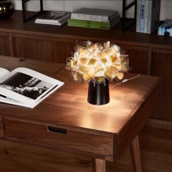 Distinguished Slamp Clizia table lamp crafted in Italy with 230 interlocked Lentiflex® squares and a sleek black conical base