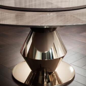 Exceptional Costantini Pietro Grand Palais table with a light brown tabletop and sinuous pedestal base in matte neutral with reflective elements