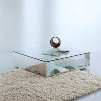 Elegant Acerbis Litt coffee table with clear glass top and sides, paired with a glossy white base
