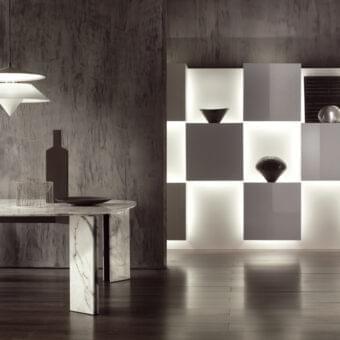 Exceptional Acerbis Maxwell table crafted with light gray marble-like composite and uniquely shaped metal legs with polished finish