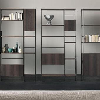 Distinguished Acerbis Outline bookcase with wood and dark matte metal, exhibiting a rectilinear form and textured grain finish