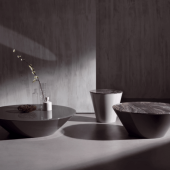 Distinguished Acerbis Pond side table with a conical base lacquered in glossy finishes and a dark swirled stone top
