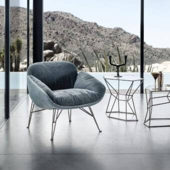 Exceptional Arketipo Juno lounge chair with textured blue-grey textile upholstery and bright metal base
