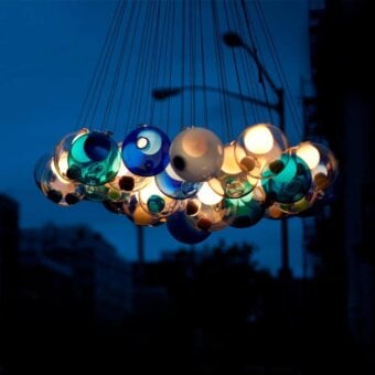 Captivating Bocci 28 Cluster suspension lamp with organically arranged glass spheres in blue, teal, clear and milk white hues with adjustable metallic wiring