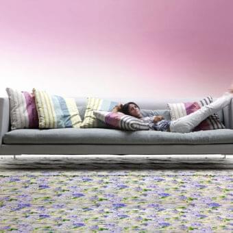 Distinguished Erba Altoborgo sofa with light gray cotton upholstery and a matt satined chrome metal base