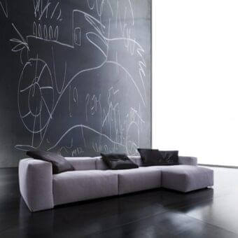 Superior Erba Aspettami sofa with light gray textured cotton upholstery and cylindrical steel bars built with a solid wood base