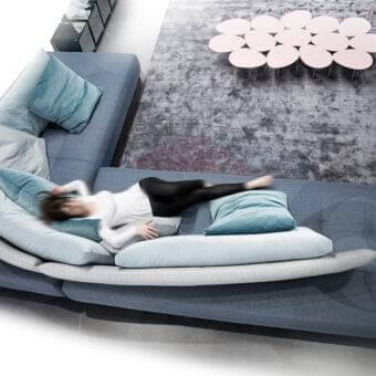 Distinguished Erba Conversation sectional with blue textile upholstery and light blue grey cushions built with a solid wood frame
