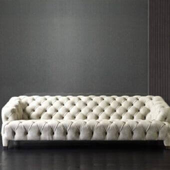 Elegant Rugiano Cloud sofa upholstered in plush light cream textile with a refined tufted finish crafted in Italy