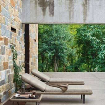 Refined Varaschin Babylon lounger with a low form and neutral beige woven textile crafted in painted aluminum