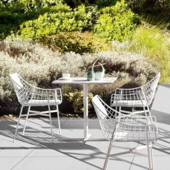 Exceptional Varaschin Summer Set armchair with a powder-coated steel grid frame and light neutral textile seat and backrest