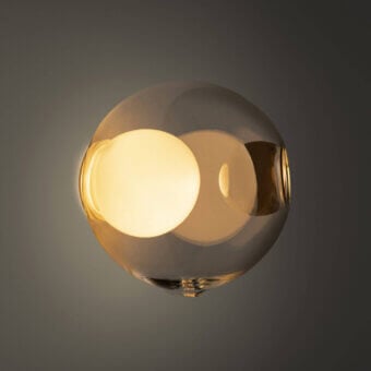 Distinguished Bocci 28s lamp crafted in clear glass with a milk white interior and satin metal mounting