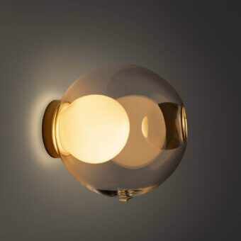 Superior Bocci 28s lamp crafted in clear glass with a milk white interior and polished brass mounting bracket
