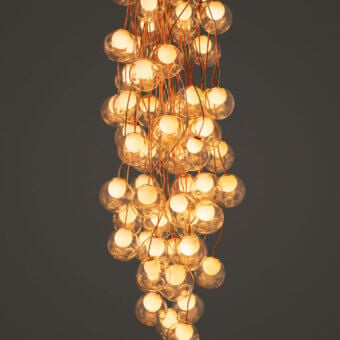Elegant Bocci 28 Copper suspension lamp built with numerous clear glass spheres and satin copper structure