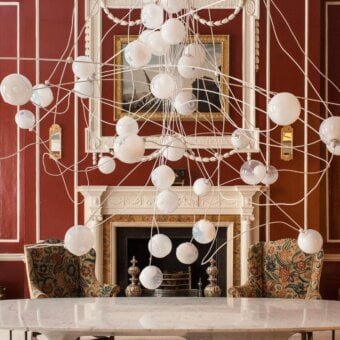Superior Bocci 28 Copper suspension lamp with sprawling clear glass exterior and milk white interior cavities built with weathered copper components