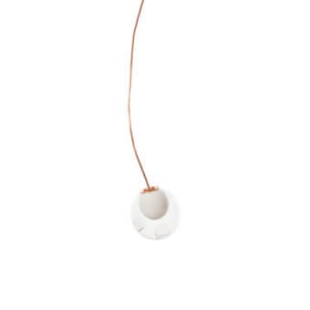 Distinguished Bocci 28 single suspension lamp with a matte white sphere and warm copper suspension rod crafted in clear glass