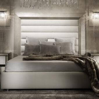 Sophisticated DV Home Collection Adler bed with neutral gray fabric upholstery and subtle silver-toned metallic trim