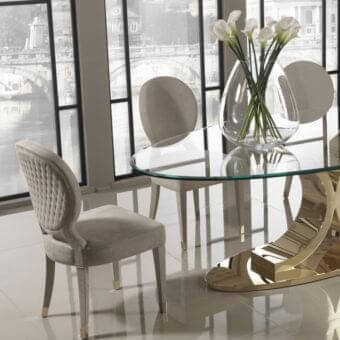 Distinguished DV Home Collection Adler chair crafted with supple leather and solid beech wood with polished golden stainless steel legs