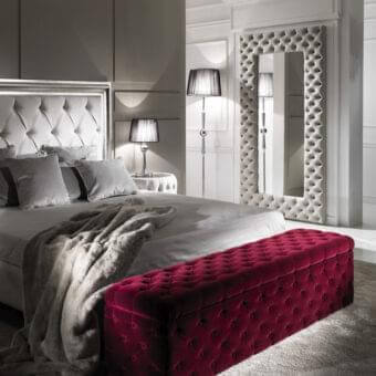 Distinguished DV Home Collection Avery trunk with crimson velvet upholstery and deep button-tufting presents a harmonious design