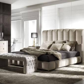 Distinguished DV Home Collection Byron bed with textured neutral beige fabric upholstery and vertically paneled headboard