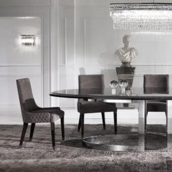 Sophisticated Byron chair by DV Home Collection with quilted grey-brown fabric upholstery and satin wood finish