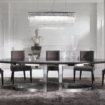 Distinguished DV Home Collection Byron chair with uniform gray textile upholstery and glossy stainless steel legs