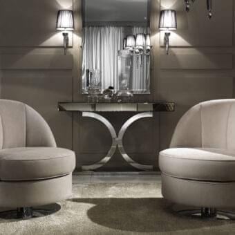 Distinguished DV Home Collection Charlotte lounge chair with light beige fabric upholstery and shining stainless steel swivel base