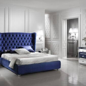 Exceptional DV Home Collection Vogue bed with plush blue velvet textile and diamond tufting