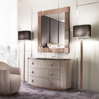 Exceptional DV Home Collection Vogue dresser with curved form, leather drawers and coordinating marble top in light gray textile with stainless steel base