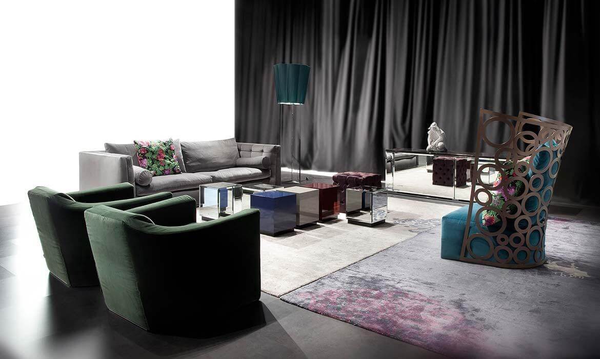 Distinguished Erba Profile lounge chair crafted with solid wood and multilayer wood, showcasing blue textile upholstery with floral accents