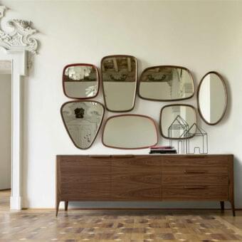 Superior Porada Mix mirror with turnable display and solid canaletta walnut frame offering a harmonious clear reflection