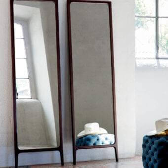 Distinguished Porada Rimmel mirror crafted in solid ash wood with a warm medium-brown tone and smooth satin finish