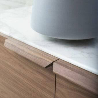 Exceptional Porada Atlante sideboard built in Canaletto walnut with white Calacatta Gold marble and a smooth matte finish