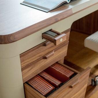 Elegant Porada Flavio desk in canaletto walnut with cream hide leather top and refined stitching