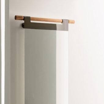 Exceptional Porada Hook mirror with clear reflection and Canaletto Walnut support in dark gray matte metal brackets