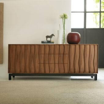 Exceptional Porada Masai sideboard with undulating solid canaletto walnut and brown matt metal base
