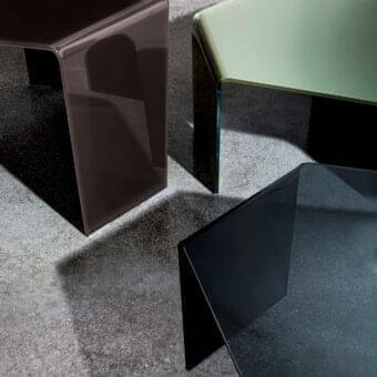 Elegant Sovet Italia coffee table with a bent glass hexagonal top and glossy black finish