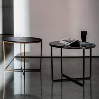 Distinguished Sovet Italia Piktor side table with burnished metal frame and dark glossy lacquered glass top
