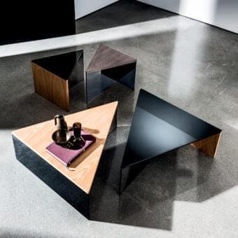 Superior Sovet Italia Regolo coffee table with a triangular wood top and dark gray matte metal base crafted in smoked and black laminated glass