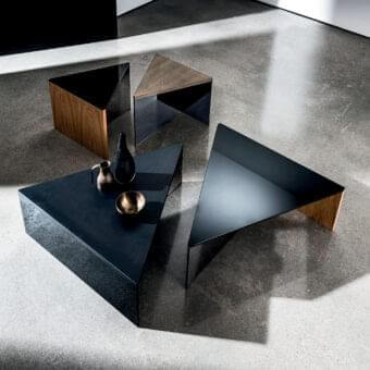 Sophisticated Sovet Italia Regolo table with dark triangular top and geometric base crafted in smoked glass and black lacquered laminated glass