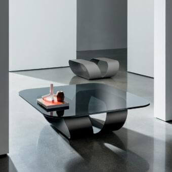 Exceptional Sovet Italia Ring coffee table with sculpted dark gray metal base and clear glass top in matte finish